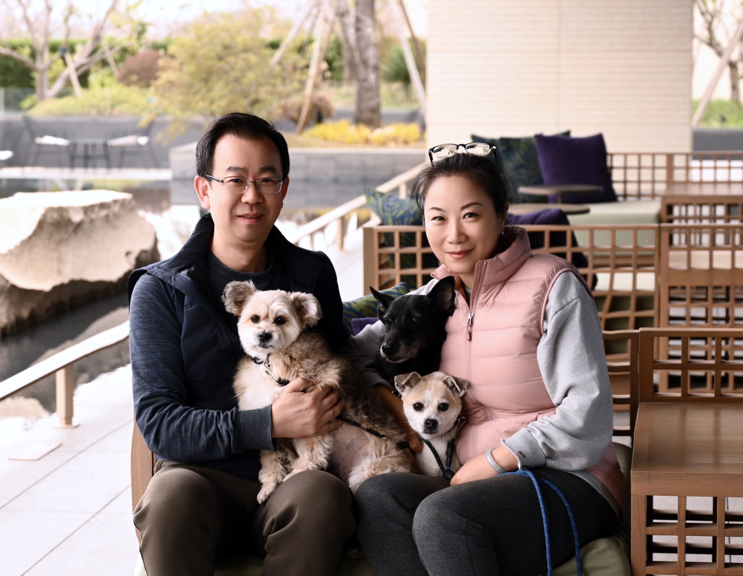 A picture of me, my wife, and our three adopted dogs